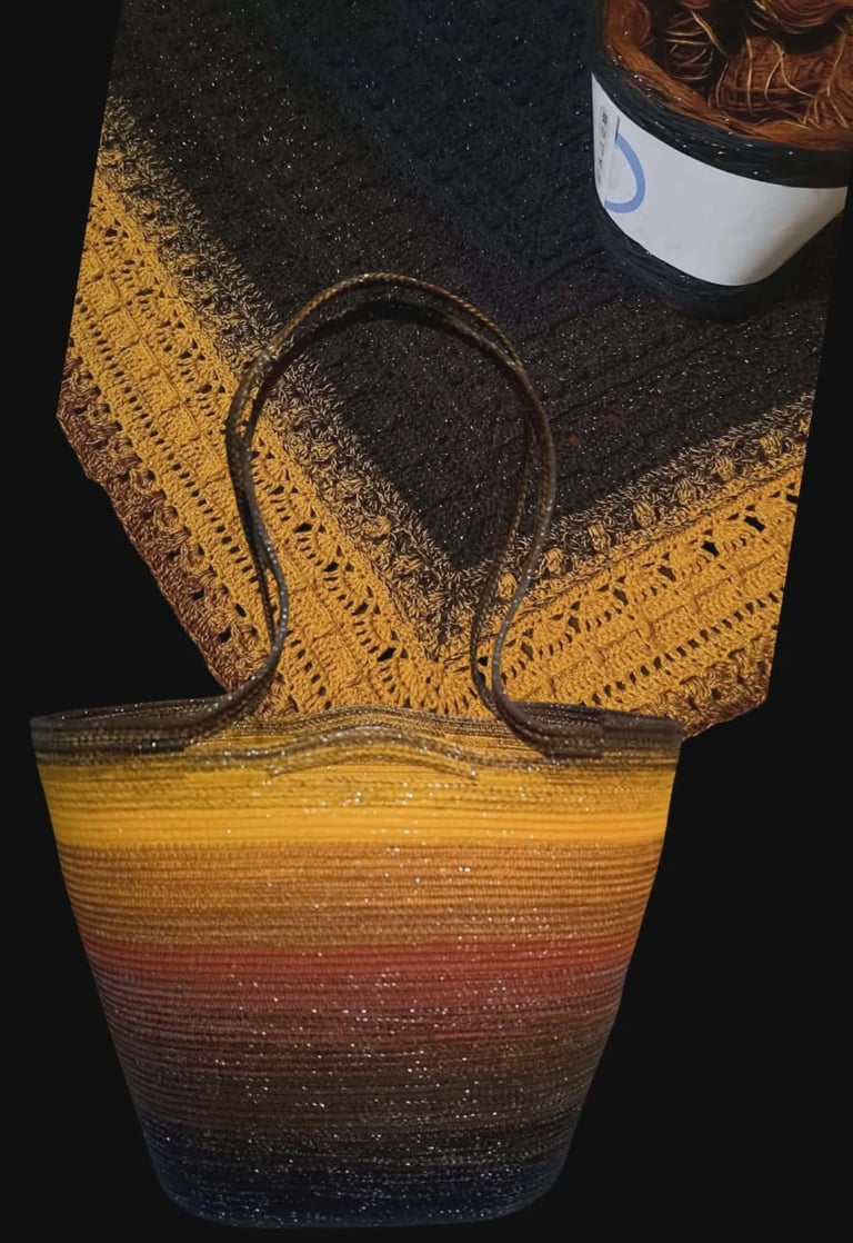 Woven basket with rainbow striped colors in yellow, red, and blue tones, draped with a tan and brown patterned fabric
