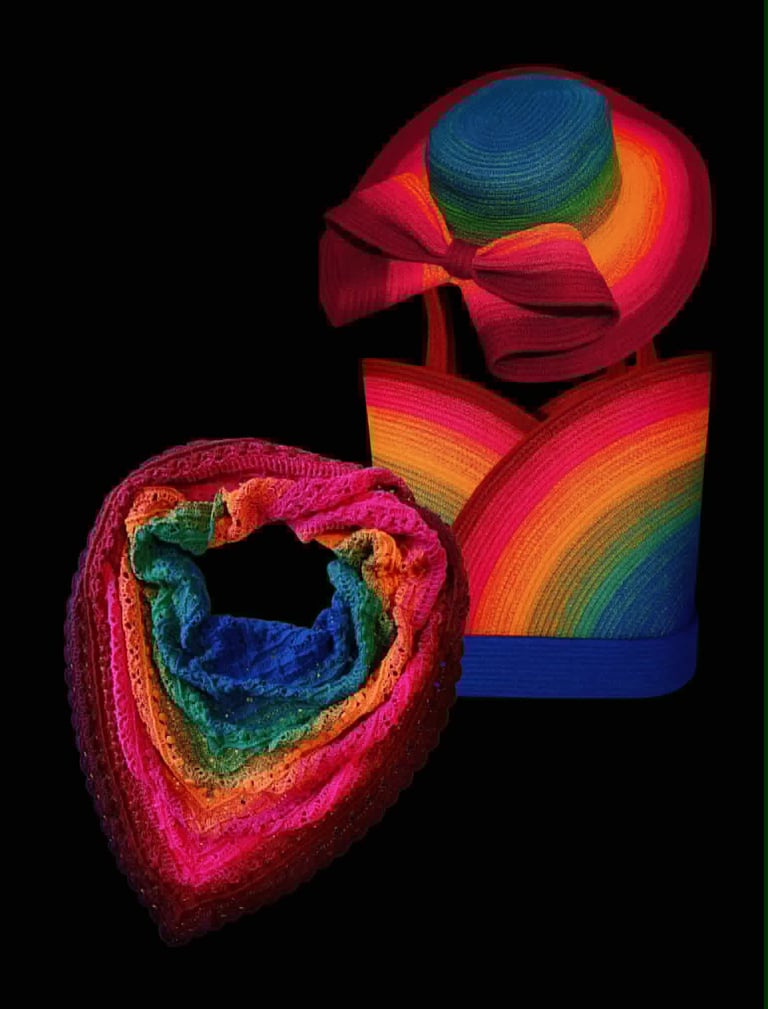 Colorful crocheted art pieces featuring rainbow stripes and knitted textures on black background